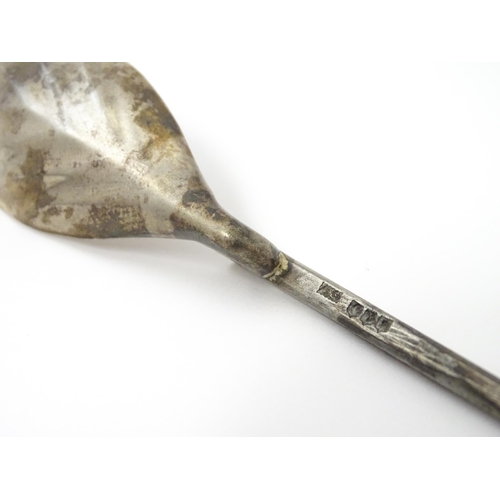 254 - A silver replica of a Roman Christening spoon, indistinctly marked. Approx. 8 1/4