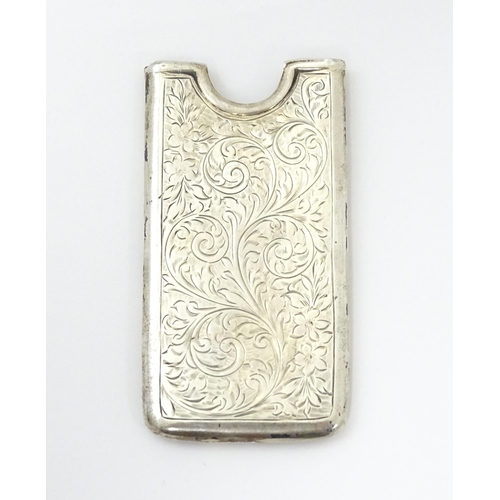 269 - A silver card case with engraved decoration, hallmarked Birmingham c. 1906, maker George Bowen & Son... 