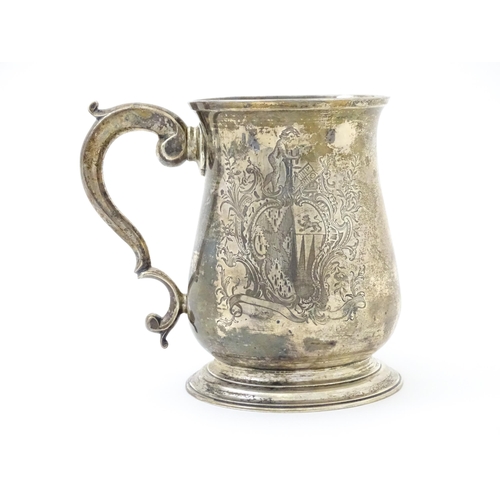 271 - A Geo II silver tankard / mug with engraved heraldic armorial coat of arms decoration hallmarked Lon... 