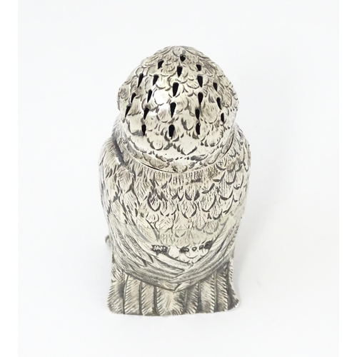 258 - A Victorian silver novelty pepperette modelled as an owl with glass eyes, hallmarked London 1853, ma... 