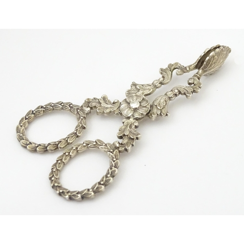 263 - William IV silver sugar nips with foliate detail and laurel chaplet formed handles, hallmarked Birmi... 