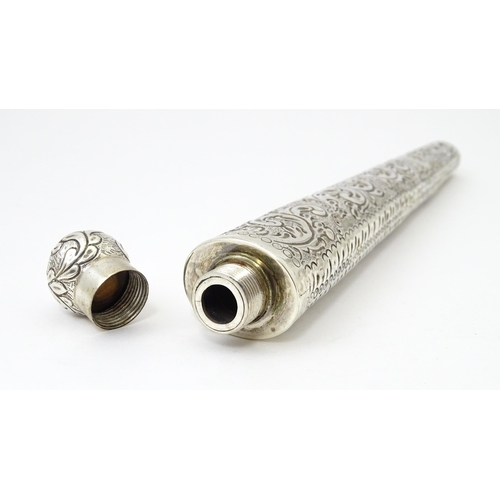 342 - A silver scent bottle / flask with embossed detail, hallmarked London 1883, maker SC/ Approx 10