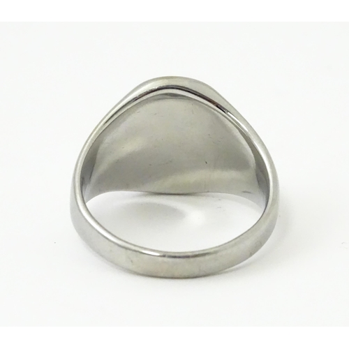 A Gentleman's white metal ring with engraved Christian symbolism ...