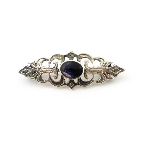 732 - A brooch marked 'silver' and set with Blue John to centre.  Approx 1 3/4