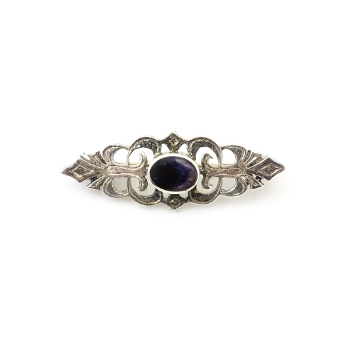 732 - A brooch marked 'silver' and set with Blue John to centre.  Approx 1 3/4