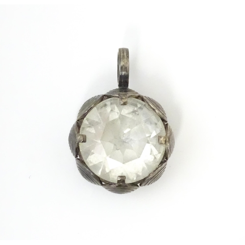 737 - A Scandinavian silver pendant set with facet cut white stone to centre. Stamped with anvil mark for ... 