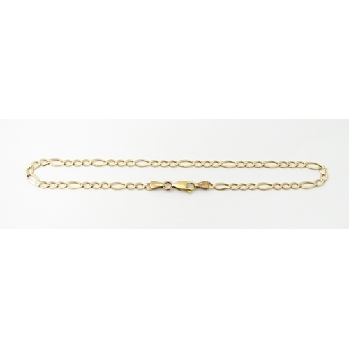 744 - A 9ct gold anklet / large bracelet. Approx 9