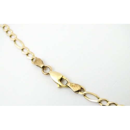 744 - A 9ct gold anklet / large bracelet. Approx 9