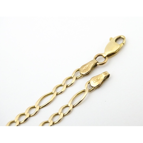 744 - A 9ct gold anklet / large bracelet. Approx 9