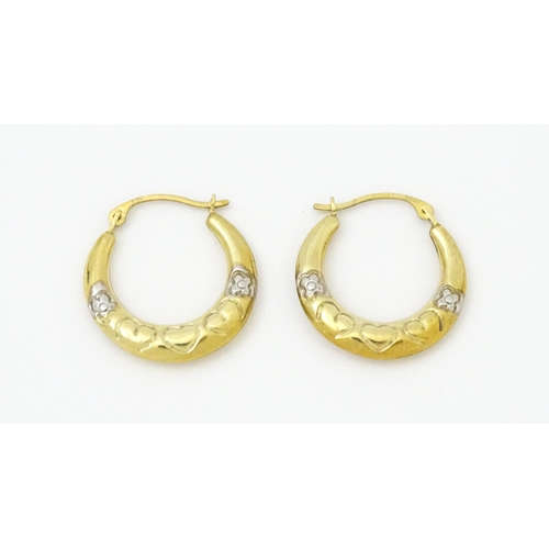 751 - A pair of 9ct gold hoop earrings. Approx. 3/4