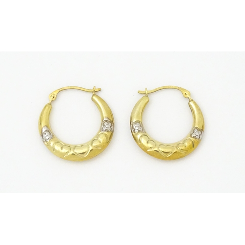 751 - A pair of 9ct gold hoop earrings. Approx. 3/4