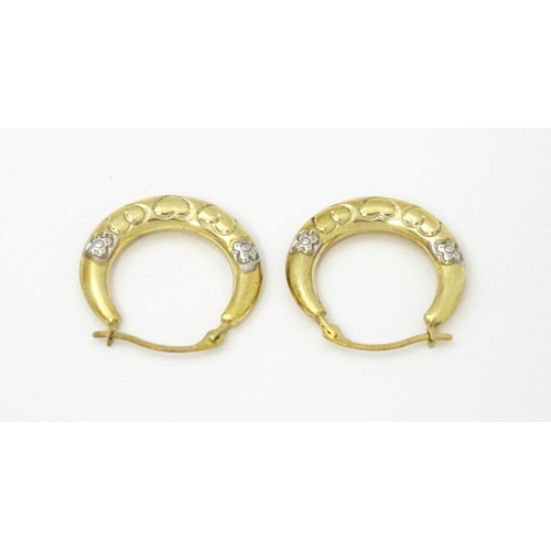 751 - A pair of 9ct gold hoop earrings. Approx. 3/4