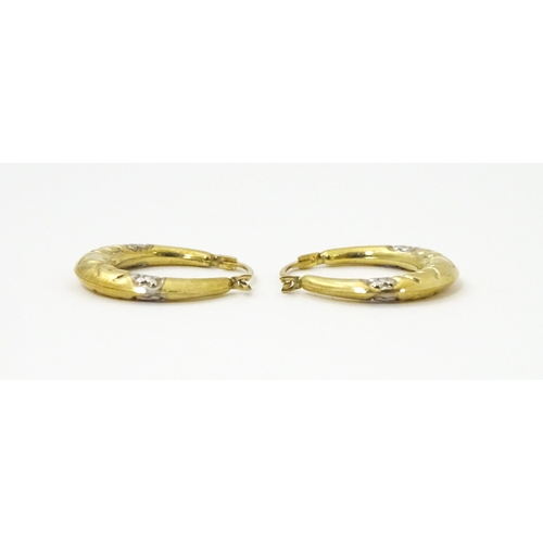 751 - A pair of 9ct gold hoop earrings. Approx. 3/4