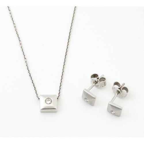 759 - An 18ct white gold chain necklace with diamond set pendant together with matching stud earrings. nec... 