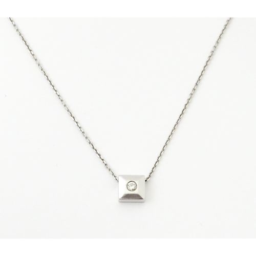 759 - An 18ct white gold chain necklace with diamond set pendant together with matching stud earrings. nec... 