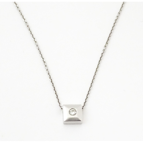 759 - An 18ct white gold chain necklace with diamond set pendant together with matching stud earrings. nec... 