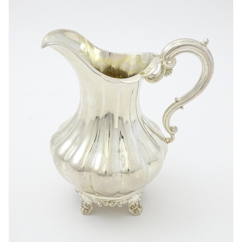 251 - A Victorian silver jug hallmarked London 1851, maker Samuel Hayne & Dudley Cater. Approx. 6 1/4