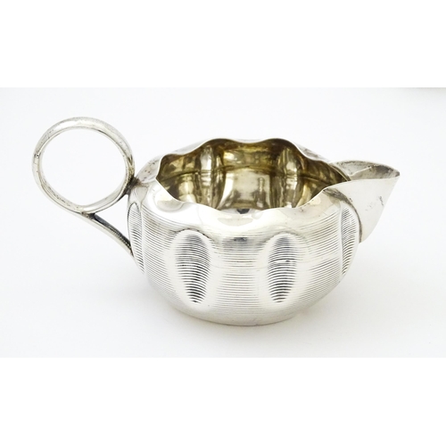 352 - Assorted silver items to include a silver cream jug hallmarked Birmingham 1890 maker Stokes & Irelan... 