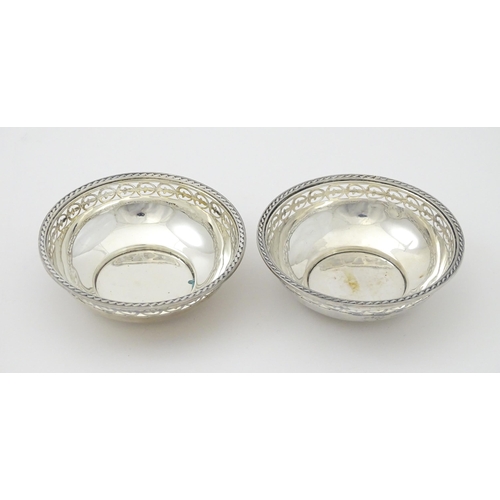 368 - A pair of silver bon bon dishes hallmarked Sheffield 1932, maker Walker & Hall. Approx. 4