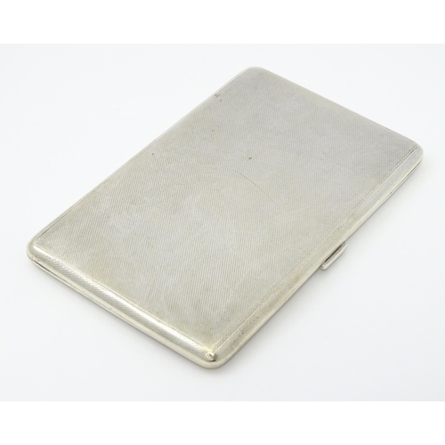 373 - An Art Deco silver cigarette case with three sectional interior hallmarked Birmingham 1933, maker Ro... 