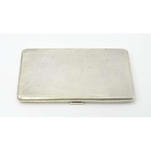 373 - An Art Deco silver cigarette case with three sectional interior hallmarked Birmingham 1933, maker Ro... 