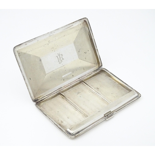 373 - An Art Deco silver cigarette case with three sectional interior hallmarked Birmingham 1933, maker Ro... 