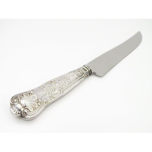 379 - A boxed silver handled cake knife  hallmarked Sheffield 1978 maker Harrison Brother together with a ... 