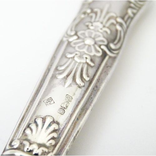 379 - A boxed silver handled cake knife  hallmarked Sheffield 1978 maker Harrison Brother together with a ... 