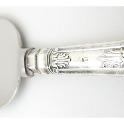 379 - A boxed silver handled cake knife  hallmarked Sheffield 1978 maker Harrison Brother together with a ... 