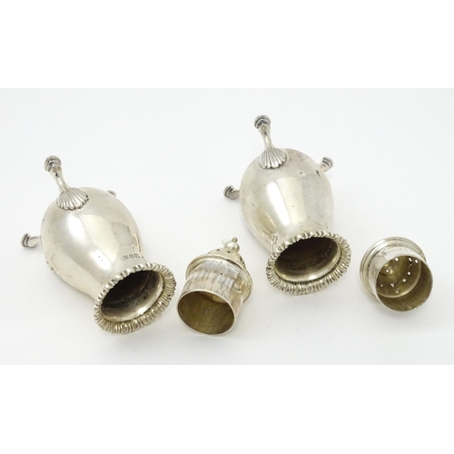 383 - A pair of silver peppers hallmarked Chester 1911, maker Jay, Richard Attenborough Co Ltd. Approx. 3 ... 