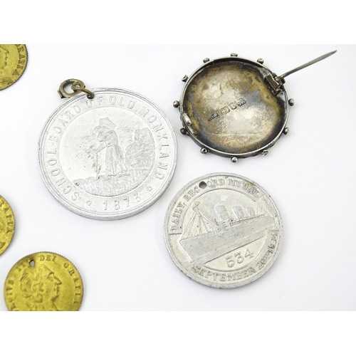 911 - Assorted items to include tokens as Geo III spade guinea coins, etc. a Victorian silver brooch depic... 