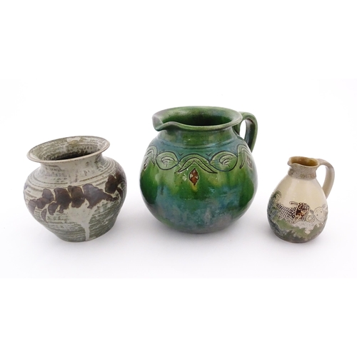 103 - Three assorted studio pottery items comprising a Spanish jug with banded detail marked Gongora Ubeda... 