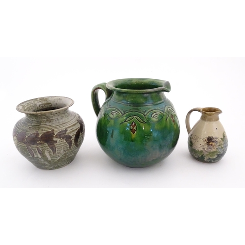 103 - Three assorted studio pottery items comprising a Spanish jug with banded detail marked Gongora Ubeda... 