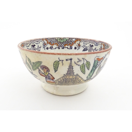 72 - A Scottish bowl with Chinoiserie depicting figures in a landscape. Possibly Bell's Pottery. Approx. ... 