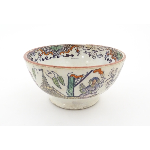 72 - A Scottish bowl with Chinoiserie depicting figures in a landscape. Possibly Bell's Pottery. Approx. ... 