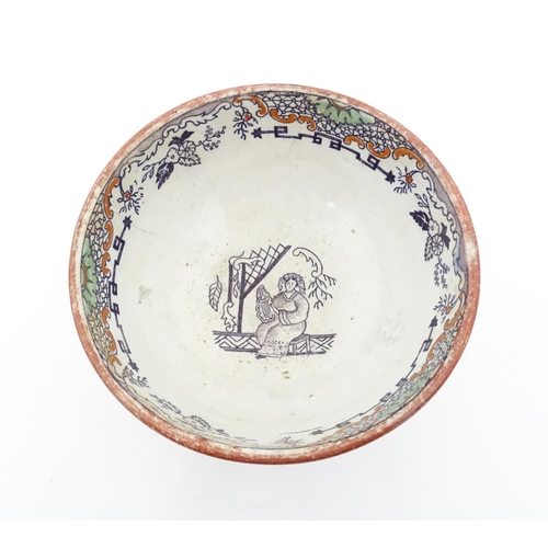 72 - A Scottish bowl with Chinoiserie depicting figures in a landscape. Possibly Bell's Pottery. Approx. ... 