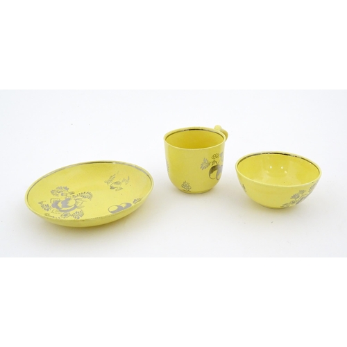 75 - A quantity of Leeds Pottery tea wares with a yellow ground decorated in silver lustre with foliage a... 