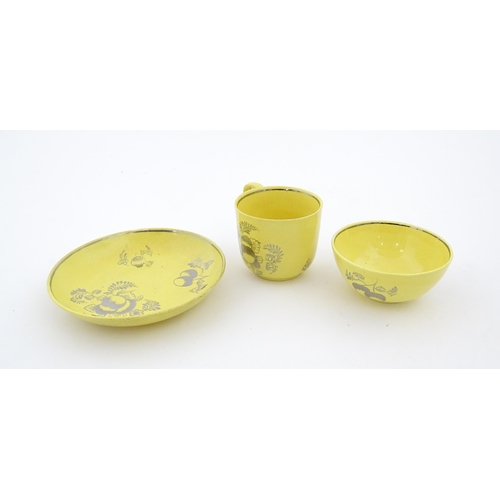 75 - A quantity of Leeds Pottery tea wares with a yellow ground decorated in silver lustre with foliage a... 