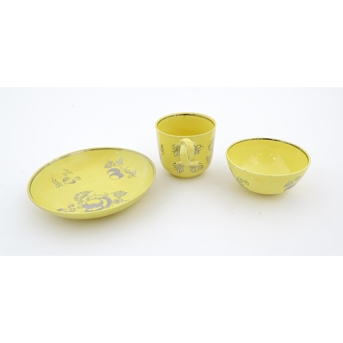 75 - A quantity of Leeds Pottery tea wares with a yellow ground decorated in silver lustre with foliage a... 