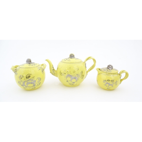 75 - A quantity of Leeds Pottery tea wares with a yellow ground decorated in silver lustre with foliage a... 