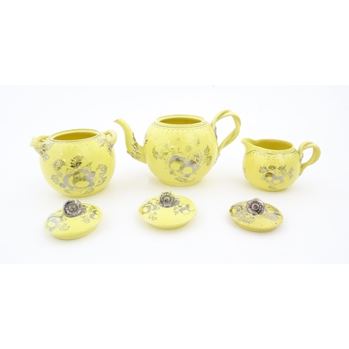 75 - A quantity of Leeds Pottery tea wares with a yellow ground decorated in silver lustre with foliage a... 