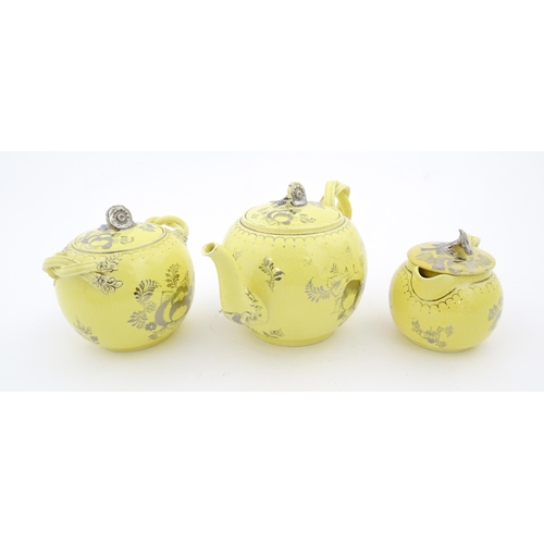 75 - A quantity of Leeds Pottery tea wares with a yellow ground decorated in silver lustre with foliage a... 