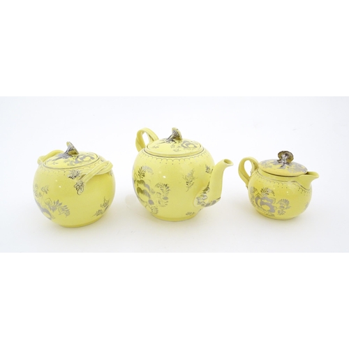 75 - A quantity of Leeds Pottery tea wares with a yellow ground decorated in silver lustre with foliage a... 