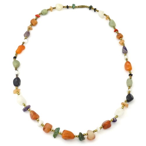 760 - A bead necklace with various hardstone beads. Approx 26