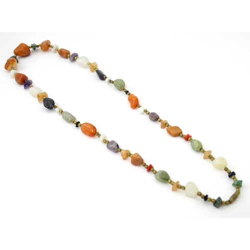 760 - A bead necklace with various hardstone beads. Approx 26