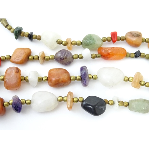 760 - A bead necklace with various hardstone beads. Approx 26