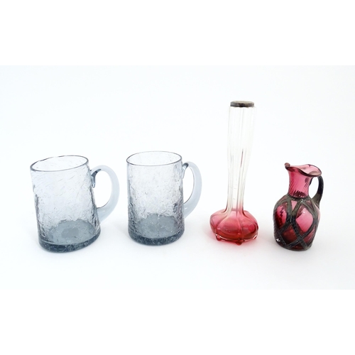 184 - A pair of glass mugs / tankards together with an Art Nouveau cranberry to clear glass bud vase with ... 