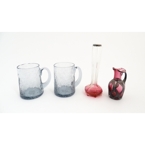 184 - A pair of glass mugs / tankards together with an Art Nouveau cranberry to clear glass bud vase with ... 