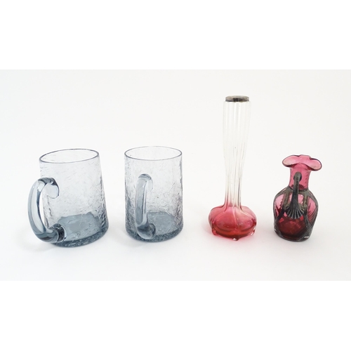 184 - A pair of glass mugs / tankards together with an Art Nouveau cranberry to clear glass bud vase with ... 