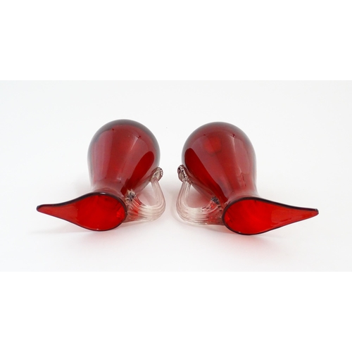 187 - Two Whitefriars ruby glass jugs. Together with a studio glass bowl with controlled bubble detail . J... 